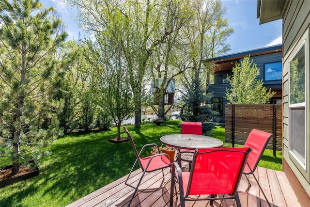 410 River Rd, Steamboat Springs, CO 80487 - deck with a yard and outdoor dining area