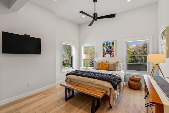 410 River Rd, Steamboat Springs, CO 80487 - bedroom featuring recessed lighting, light wood-style floors, baseboards, a towering ceiling, and a ceiling fan