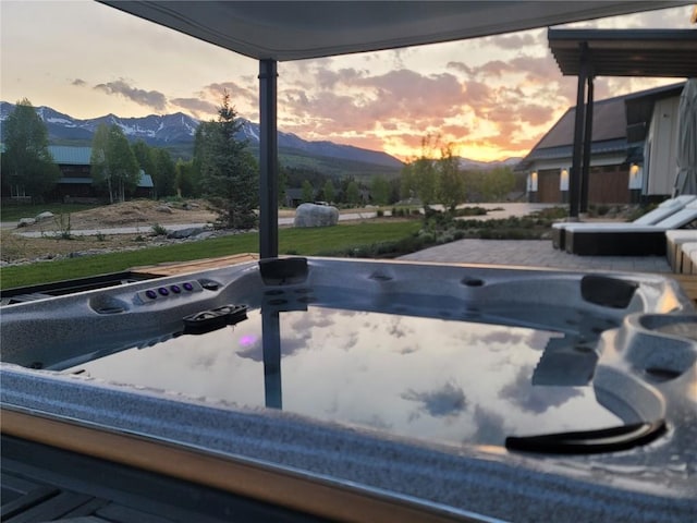 403 Revett Dr, Breckenridge, CO 80424 - pool at dusk featuring a mountain view