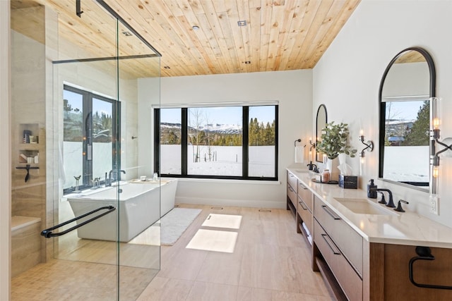 403 Revett Dr, Breckenridge, CO 80424 - full bathroom with a soaking tub, double vanity, wood ceiling, and an enclosed shower