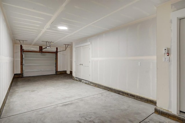 garage featuring baseboards