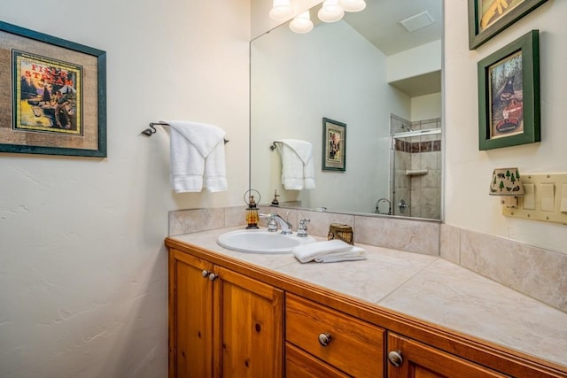 2755 Waterstone Ln Unit 35, Steamboat Springs, CO 80487 - bathroom with a tile shower and vanity