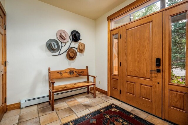 2755 Waterstone Ln Unit 35, Steamboat Springs, CO 80487 - foyer featuring a baseboard heating unit and baseboards