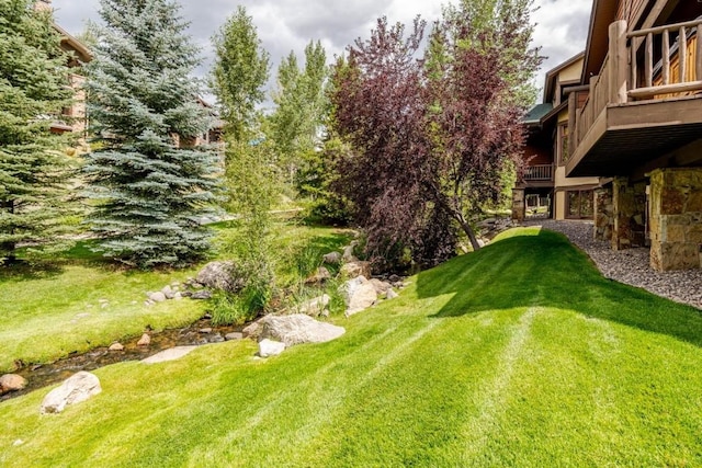 2755 Waterstone Ln Unit 35, Steamboat Springs, CO 80487 - view of green lawn with a balcony