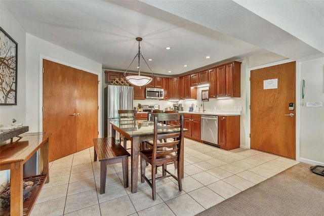 2883 Burgess Creek Rd Unit 302, Steamboat Springs, CO 80487 - dining area featuring light tile patterned floors and recessed lighting
