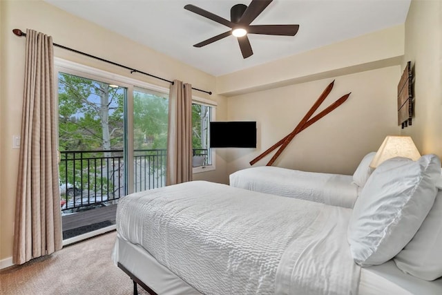 2883 Burgess Creek Rd Unit 302, Steamboat Springs, CO 80487 - carpeted bedroom featuring access to outside and a ceiling fan