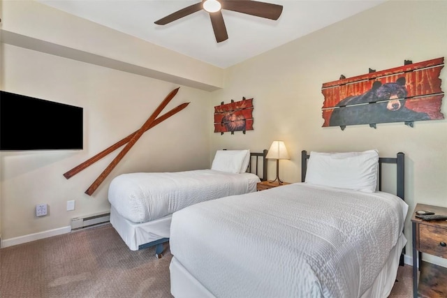 2883 Burgess Creek Rd Unit 302, Steamboat Springs, CO 80487 - bedroom featuring a baseboard heating unit, carpet, ceiling fan, and baseboards
