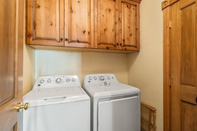 2685 Timber Ct Unit 2, Steamboat Springs, CO 80487 - laundry area with cabinet space and separate washer and dryer