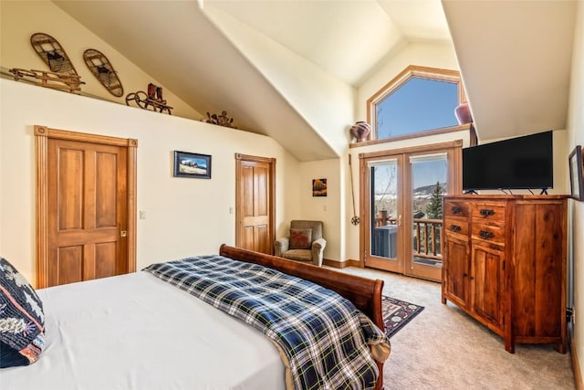 2685 Timber Ct Unit 2, Steamboat Springs, CO 80487 - bedroom featuring lofted ceiling, access to outside, and light colored carpet