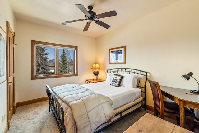 2685 Timber Ct Unit 2, Steamboat Springs, CO 80487 - bedroom featuring carpet, baseboards, and ceiling fan
