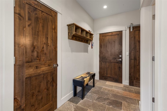 77 Red Quill Ln, Breckenridge, CO 80424 - mudroom with stone tile flooring, baseboards, and recessed lighting
