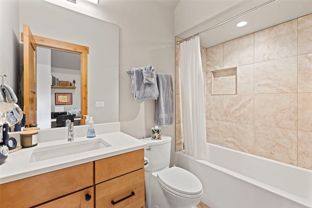 full bathroom featuring vanity, toilet, and shower / bathtub combination with curtain