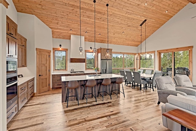 kitchen with decorative backsplash, wooden ceiling, hanging light fixtures, and appliances with stainless steel finishes