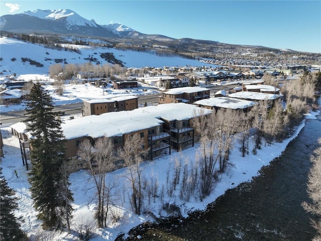 1030 Blue River Pkwy Unit A-302, Silverthorne, CO 80498 - snowy aerial view with a mountain view