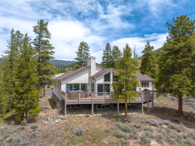 50 Lichen Ln, Keystone, CO 80435 - back of house with a deck and a chimney