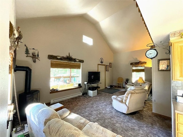 carpeted living area with a baseboard heating unit, baseboards, a wood stove, and high vaulted ceiling