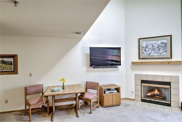 715 S 5th Ave Unit 260, Frisco, CO 80443 - sitting room with light colored carpet, baseboards, and a tile fireplace