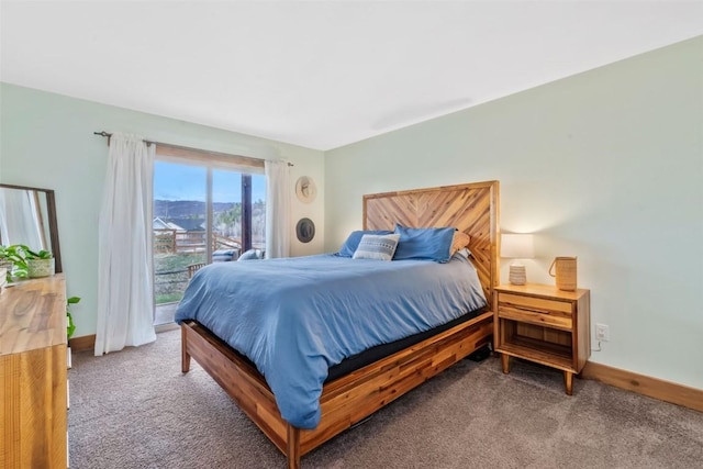 23800 County Road 16 Unit 204, Oak Creek, CO 80467 - carpeted bedroom with baseboards and access to outside