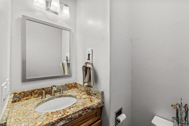24100 Cottonwood Rd N, Clark, CO 80428 - half bathroom with vanity and toilet