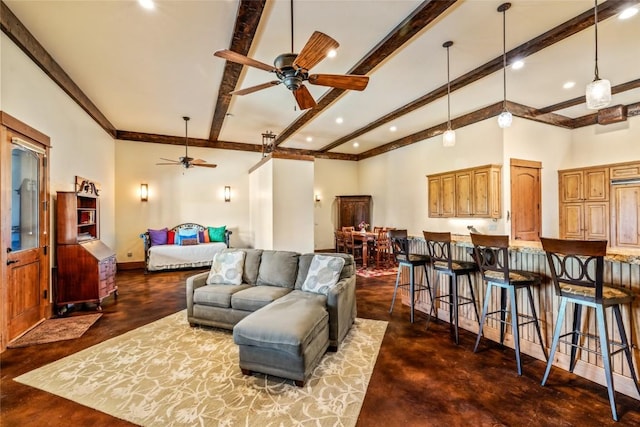 24100 Cottonwood Rd N, Clark, CO 80428 - living area with a ceiling fan, beamed ceiling, finished concrete flooring, recessed lighting, and baseboards