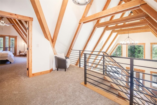 297 Robertson Ln, Breckenridge, CO 80424 - hallway with plenty of natural light, a chandelier, and carpet flooring