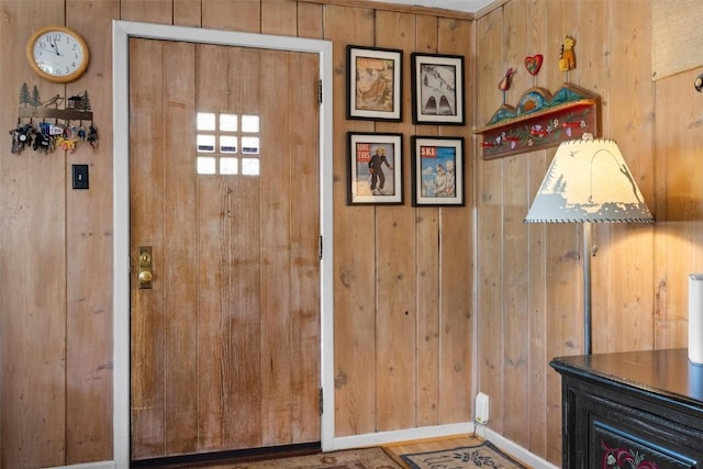 820 Yahmonite St, Steamboat Springs, CO 80487 - foyer entrance with wooden walls and baseboards