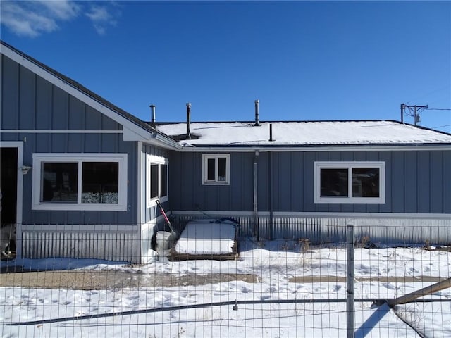 781 Hathaway St, Fairplay, CO 80440 - snow covered rear of property featuring board and batten siding