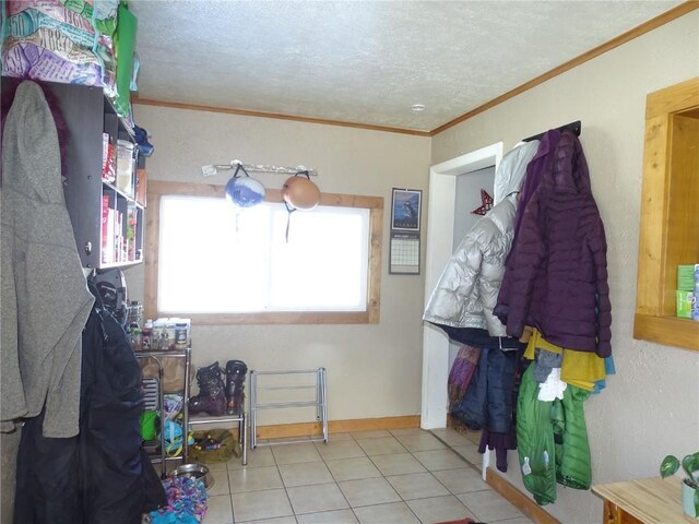 781 Hathaway St, Fairplay, CO 80440 - interior space with ornamental molding, a textured ceiling, and tile patterned flooring