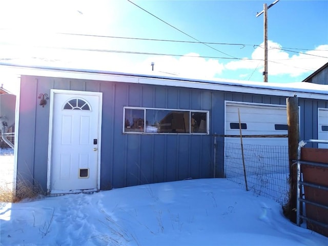 781 Hathaway St, Fairplay, CO 80440 - snow covered garage featuring fence
