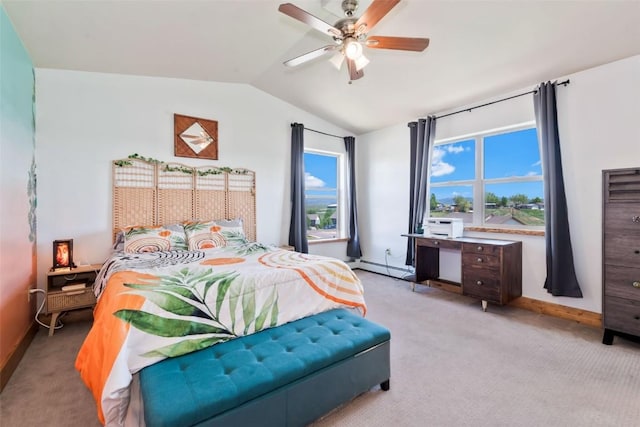 336 Starlite Ln, Hayden, CO 81639 - carpeted bedroom featuring lofted ceiling, ceiling fan, and a baseboard heating unit
