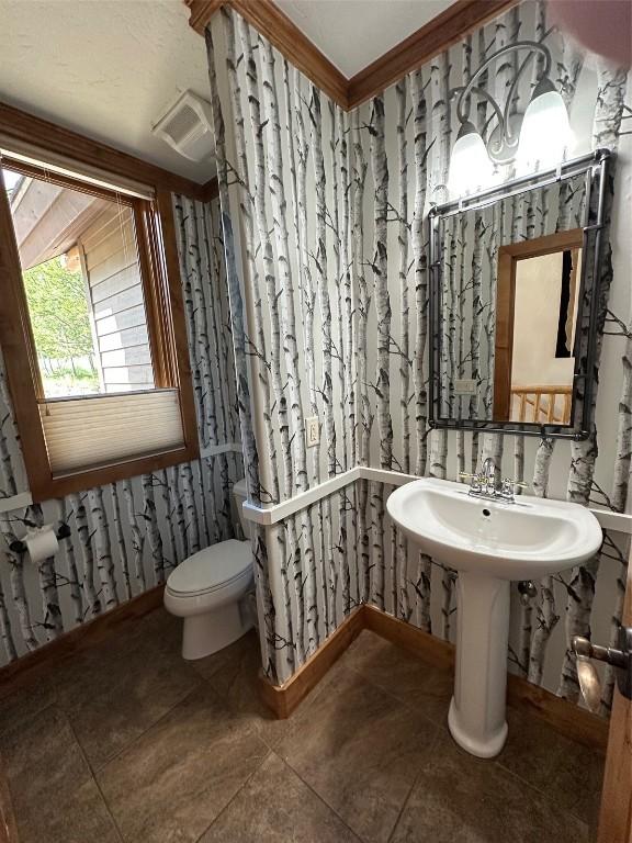 368 Black Hawk Cir, Silverthorne, CO 80498 - bathroom featuring toilet and tile patterned flooring