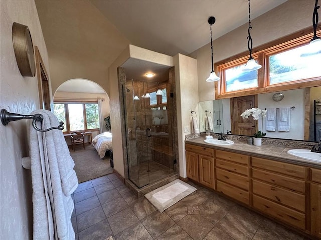 368 Black Hawk Cir, Silverthorne, CO 80498 - bathroom with a shower stall, double vanity, ensuite bath, and tile patterned flooring