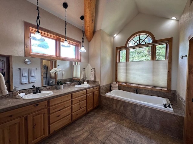368 Black Hawk Cir, Silverthorne, CO 80498 - full bath featuring a garden tub, lofted ceiling, and double vanity