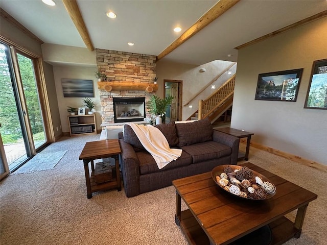 368 Black Hawk Cir, Silverthorne, CO 80498 - living area featuring light colored carpet, beamed ceiling, stairs, a stone fireplace, and recessed lighting