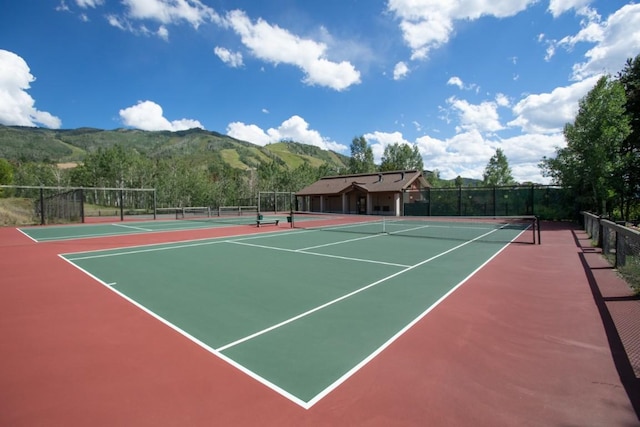 1720 Ranch Rd Unit 301, Steamboat Springs, CO 80487 - view of tennis court with a mountain view and community basketball court