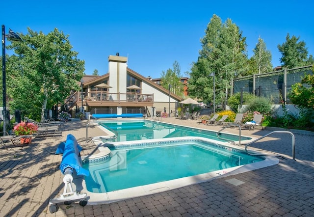 1720 Ranch Rd Unit 301, Steamboat Springs, CO 80487 - community pool with a patio and a jacuzzi