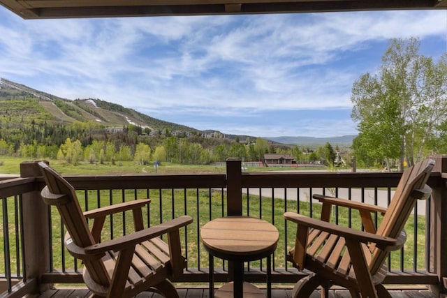 1720 Ranch Rd Unit 301, Steamboat Springs, CO 80487 - wooden deck featuring a mountain view