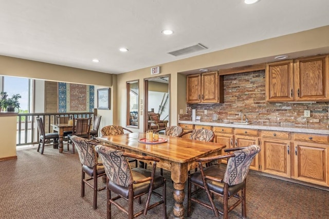 1720 Ranch Rd Unit 301, Steamboat Springs, CO 80487 - dining room with dark carpet and recessed lighting