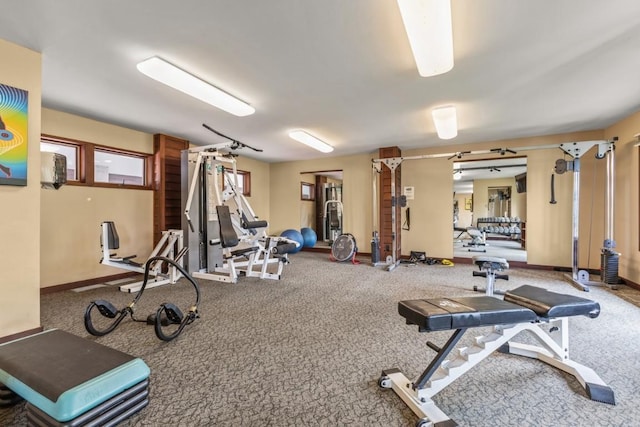 1720 Ranch Rd Unit 301, Steamboat Springs, CO 80487 - exercise room with baseboards and carpet flooring