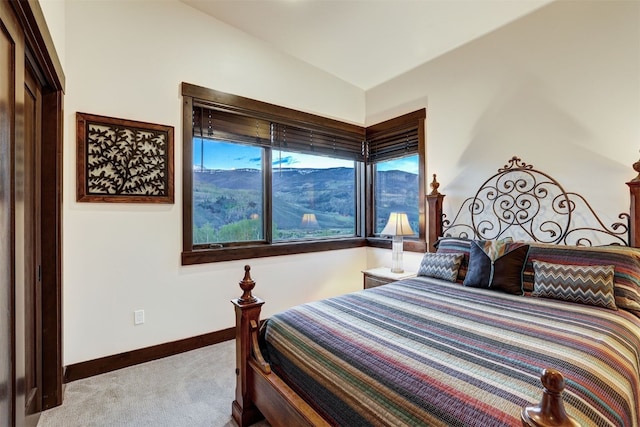 53 Hargrove Way, Silverthorne, CO 80498 - carpeted bedroom with baseboards and vaulted ceiling