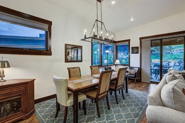 53 Hargrove Way, Silverthorne, CO 80498 - dining space featuring dark wood-type flooring, a chandelier, recessed lighting, and baseboards