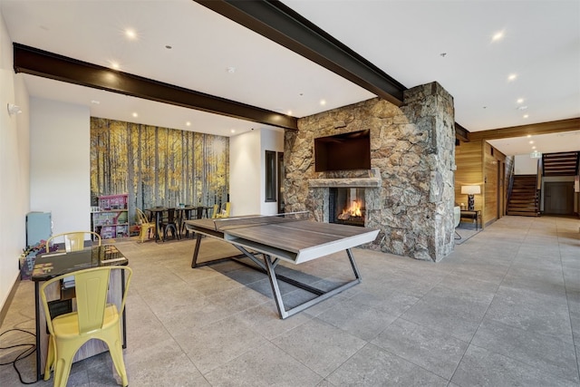 53 Hargrove Way, Silverthorne, CO 80498 - playroom with beamed ceiling, a fireplace, and recessed lighting