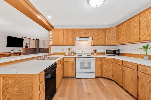 211 W Oak St, Oak Creek, CO 80467 - kitchen with white range with electric cooktop, black dishwasher, stainless steel microwave, under cabinet range hood, and light wood-style floors