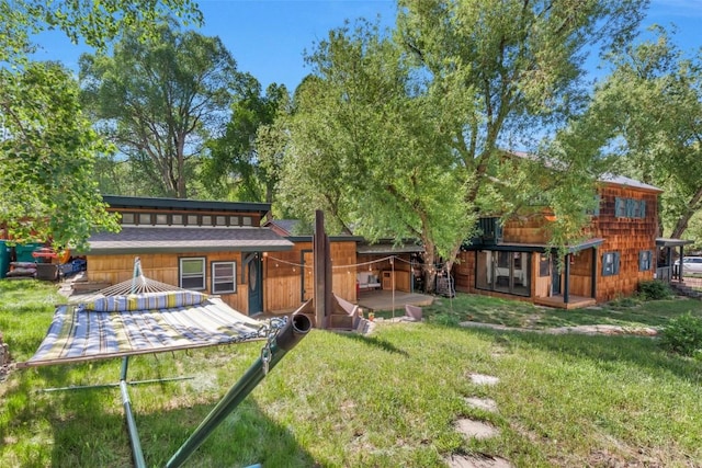 211 W Oak St, Oak Creek, CO 80467 - back of property featuring a yard