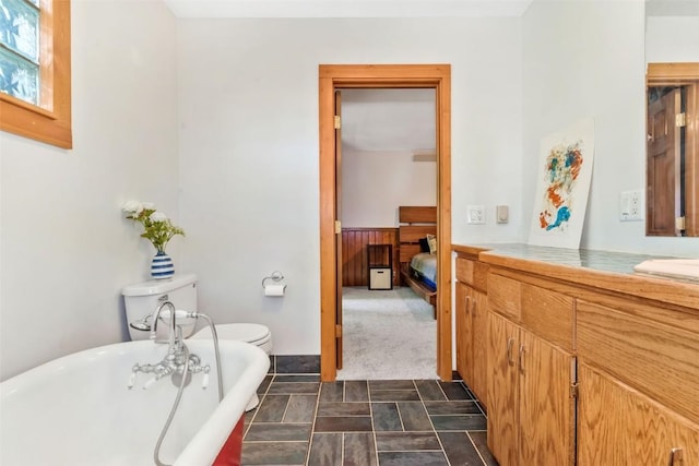 211 W Oak St, Oak Creek, CO 80467 - ensuite bathroom featuring a freestanding tub and vanity
