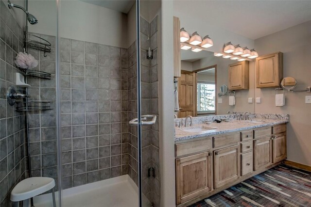 131 Allegra Ln Unit 131, Silverthorne, CO 80498 - full bathroom with a stall shower and double vanity