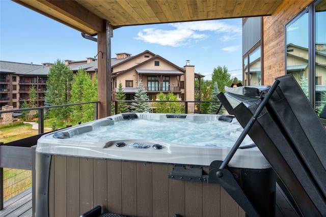 1460 Bangtail Way Unit 1B, Steamboat Springs, CO 80487 - view of patio featuring a hot tub and a balcony