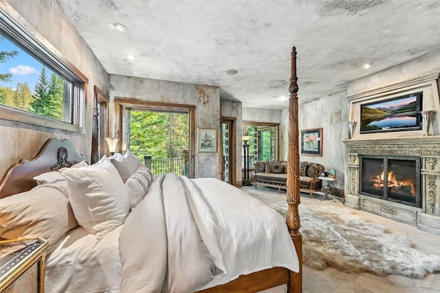 165 River Park Dr, Breckenridge, CO 80424 - bedroom featuring access to exterior and a glass covered fireplace