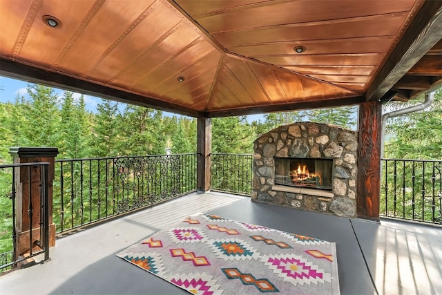 165 River Park Dr, Breckenridge, CO 80424 - view of patio featuring an outdoor stone fireplace