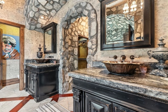 165 River Park Dr, Breckenridge, CO 80424 - bathroom featuring vanity, a chandelier, and wallpapered walls